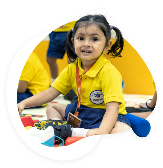 A joyful child welcoming you to Kidzee jeetshree preschool, Ratlam